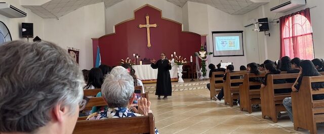 Pastor Old Barrera preaches at Holy Spirit Church and School in Tela